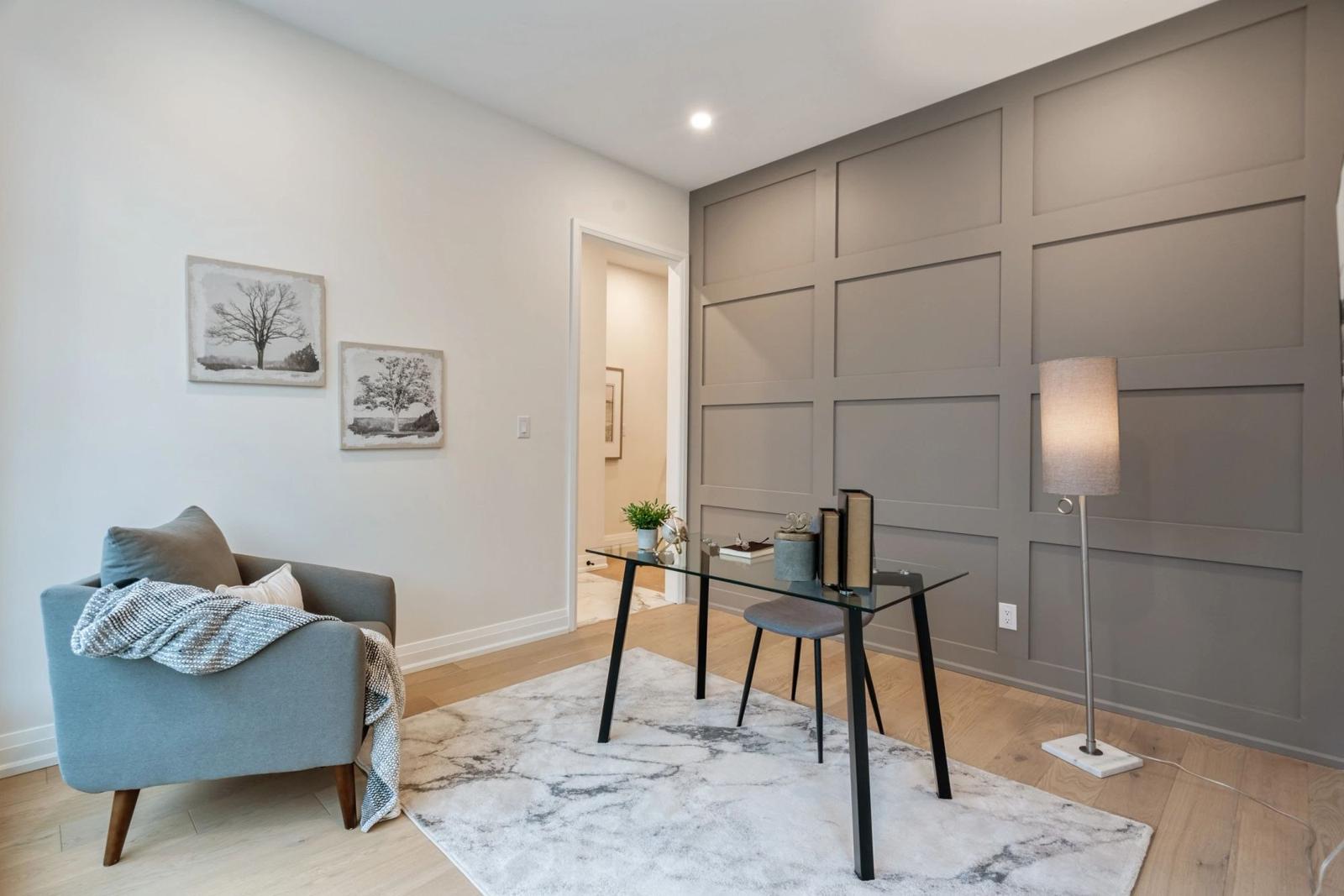 Quiet sitting room with tailored wall panels
