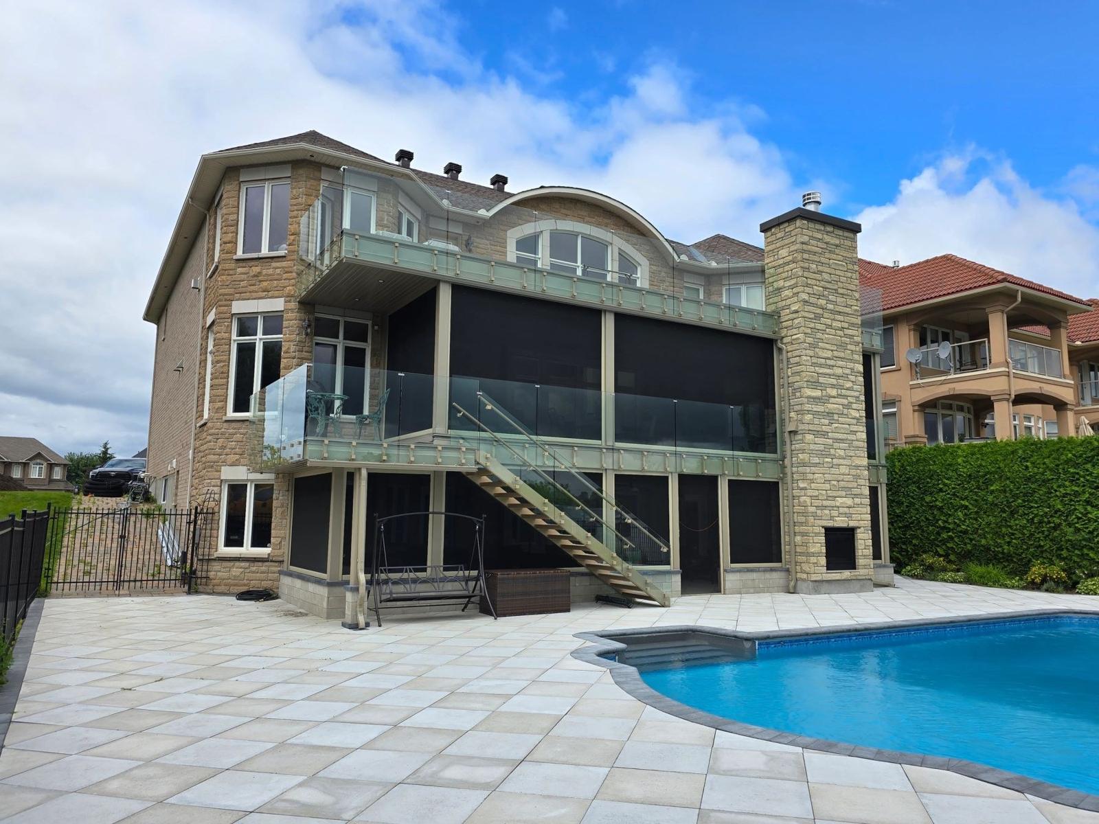 Private pool terrace at the Rideau River residence
